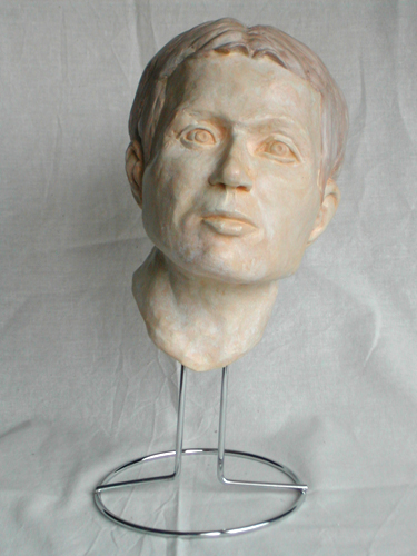plaster cast of a portrait in clay