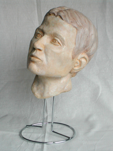 plaster cast of a portrait in clay