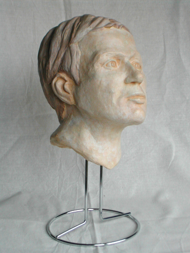 plaster cast of a portrait in clay